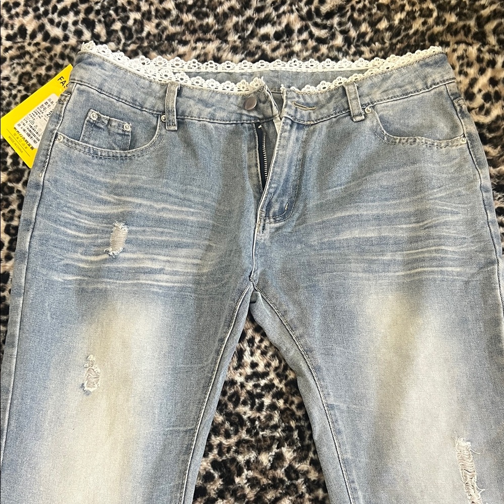 Stylish Distressed Blue Jeans with Lace Trim